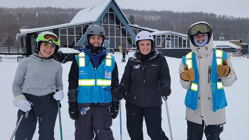 Tia Trudgeon and Elizabeth Peterson go through a mini ski school at Marquette Mountain with...