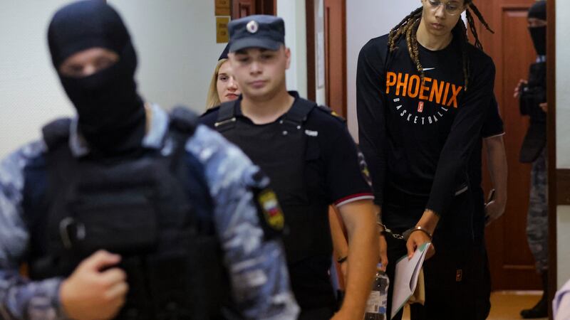 WNBA star and two-time Olympic gold medalist Brittney Griner is escorted to a courtroom for a...