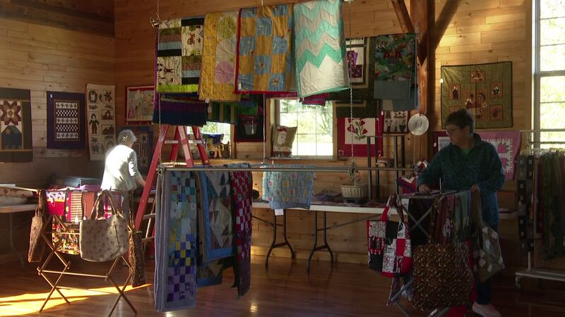 Some of the quilts and crafts ready for auction