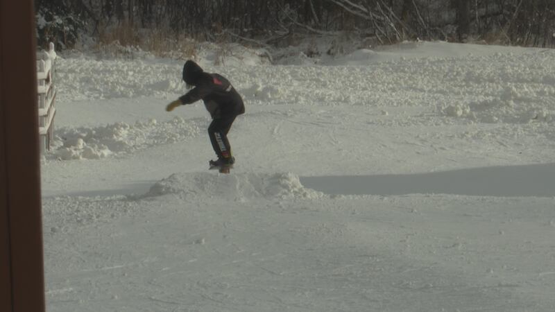Snowboarding.