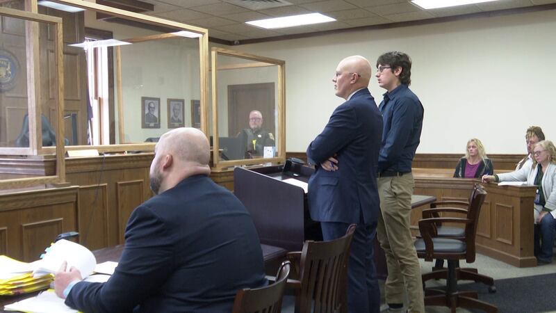 John Zanon (standing, right) pled no contest in Dickinson County District Court