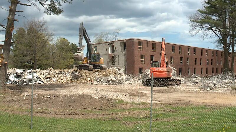 Crews doing demo work on West Hall