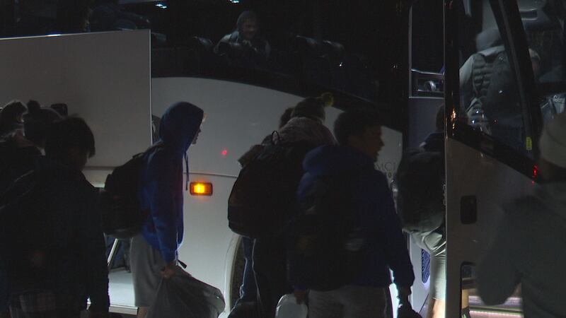 Negaunee Miners load the bus to Detroit