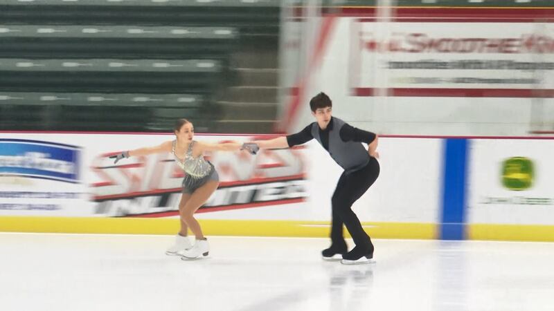 Annastasiia Smirnova (left) and Dainil Siianytsia (right) prepare to perform with over 50...
