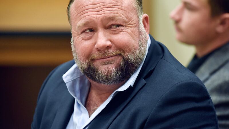 FILE - Infowars founder Alex Jones appears in court to testify during the Sandy Hook...