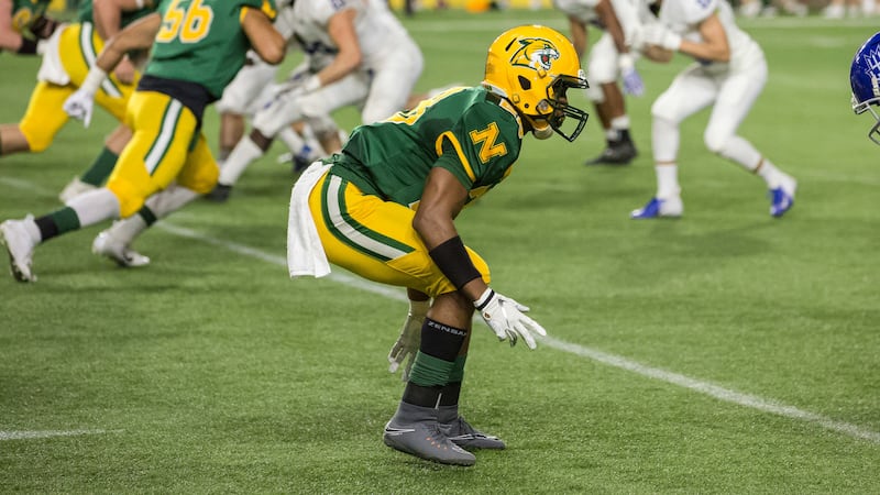 Ratavian Rinkines appears in a 2018 football game at the Superior Dome. (Photo courtesy: NMU...