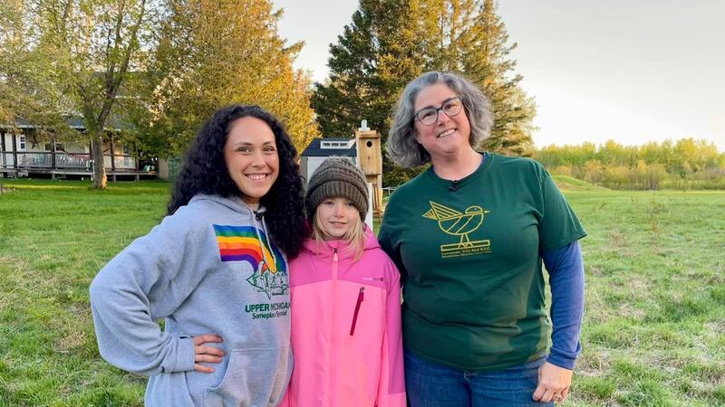 TV6's Tia Trudgeon helps Rory and Michelle Anderson release a bird into the wild after...