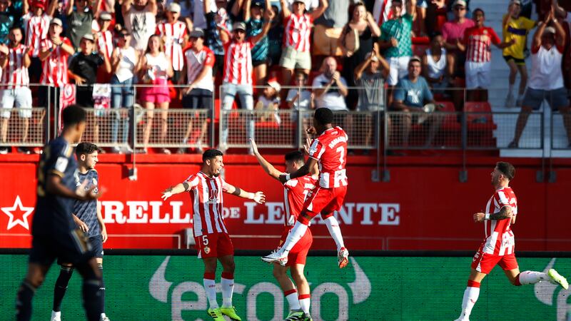 Almeria's Sergio Arribas, 3rd left, celebrates with team mates after scoring the opening goal...