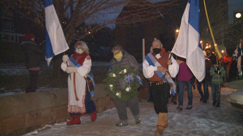 Procession from City Hall to the Finnish American Heritage Center.